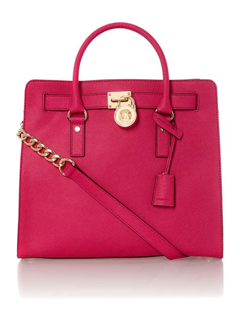 michael kors hot pink studded hamilton tote|Michael Kors nouveau Hamilton bag.